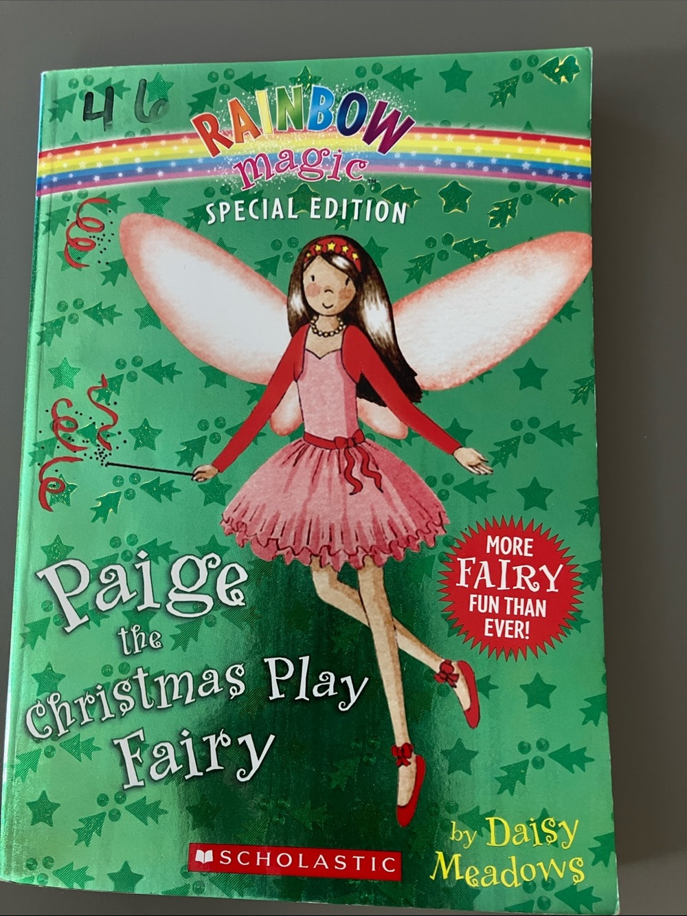 Scholastic Green Book with Pink Fairy Illustration